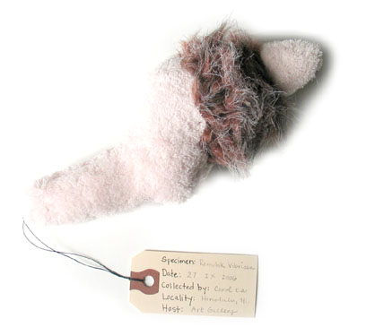Remulak Vibrissa, sculpture, Fabric, fur, thread, stuffing, and specimen tag - Ayin Es